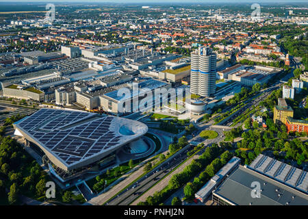 MUNICH, GERMANY - JULY 08, 2018: Aerial view of BMW Museum and BWM Welt and factory and Munich from Olympic Tower. BMW is a famous German luxury car a Stock Photo