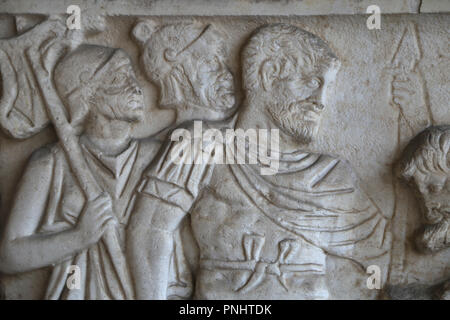 Italy. Pisa. Campo Santo. Stone sarcophagus. Relief of a roman officer with a prisioner. Roman imperial era. Stock Photo