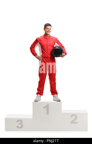 Full length portrait of a male racer winner on a winner's pedestal isolated on white background Stock Photo