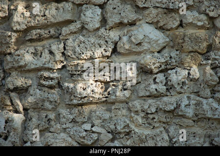 Grunge rough stone texture of an ancient wall. Texture or background for any design product Stock Photo
