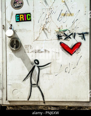 Graffiti of man and a red heart shaped ballon. Stock Photo