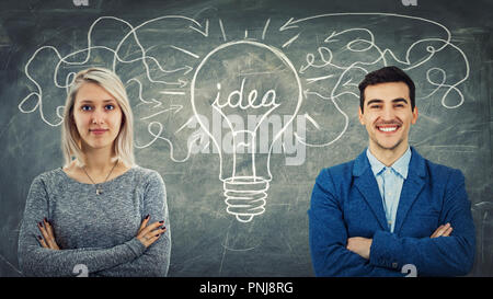 Man and woman have the same common idea, sharing thoughts together as arrow forming a big light bulb. Employee approach exchange, business relationshi Stock Photo