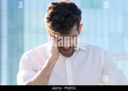 Man having a headache Stock Photo