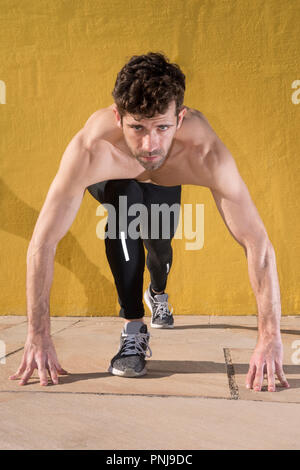 sportsman ready to run Stock Photo