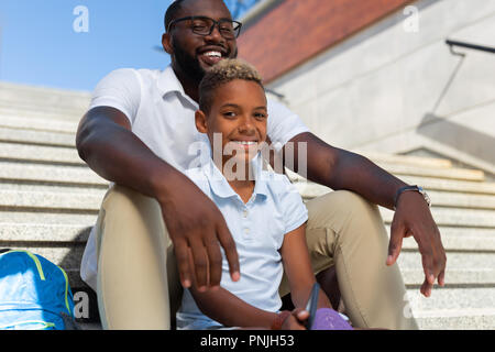 Positive pleasant nice boy looking at you Stock Photo