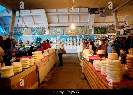 Vendors selling Sulguni brined Georgian cheese at the market in the city of Kutaisi the capital of the western region of Imereti in republic of Georgia Stock Photo