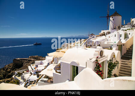 Windmill in Oia village on Santorini island, Greece. Stock Photo