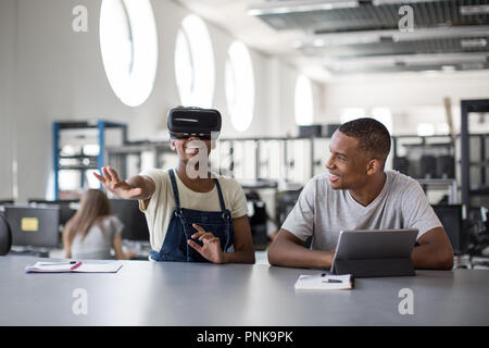 High school students using VR headset in class Stock Photo