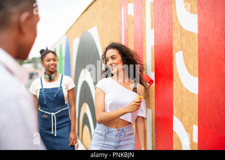 Group of teenagers working together on a community project Stock Photo