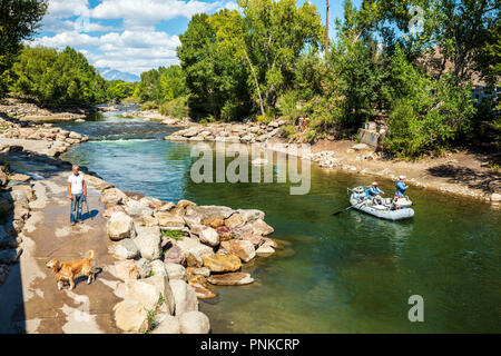 The Arkansas River runs through the downtown historic district of the small mountain town of Salida, Colorado, USA Stock Photo