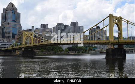 Roberto Clemente Bridge crossing the Allegheny River with downtown Pittsburgh and the Highmark Building in the background. Stock Photo