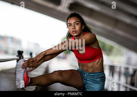 Black woman, running track and stretching in fitness workout, training or  exercise in marathon, competition or race challenge. Runner, sports athlete  Stock Photo - Alamy