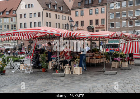 Vendors sell produce and gifts in Nuremberg Market Square Stock Photo