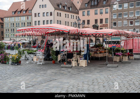 Vendors sell produce and gifts in Nuremberg Market Square Stock Photo