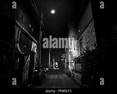 Dark alley in Montreal, Quebec, Canada, Plateau Mont-royal, at night Stock Photo