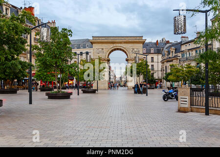 DIJON, FRANCE - AUGUST 10, 2017: Darcy square and the arch of Port Guillaume Stock Photo