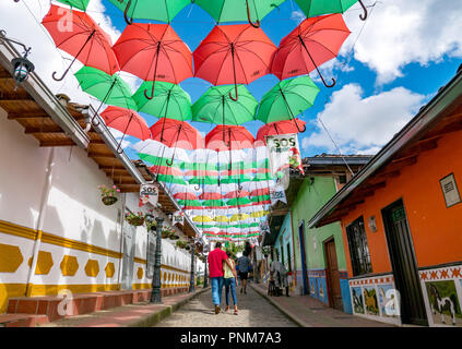 Umbrellas suspended on the streets of Guatape Colombia Stock Photo