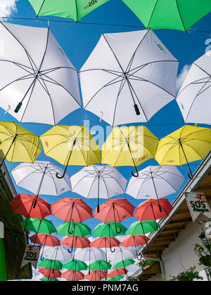 Umbrellas suspended on the streets of Guatape Colombia Stock Photo