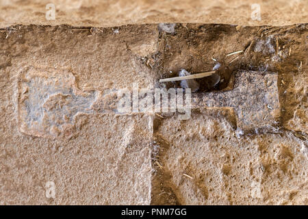 Tomb of the False Door - Main stelae field, Axum, Ethiopia. Original Metal link between the stones Stock Photo