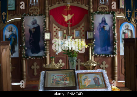 Belarus, Gomel, on July 14, 2018. Zyabrovskaya Church.The church altar is decorated with flowers. Interior of a village orthodox church Stock Photo