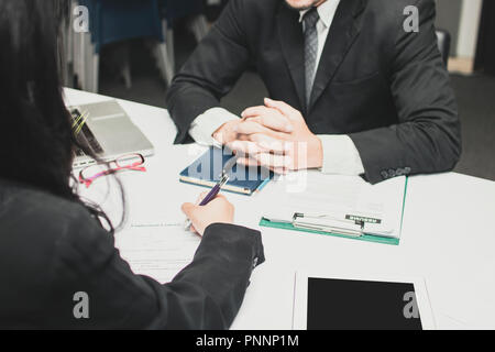 candidate woman writing and complete application form. Stock Photo