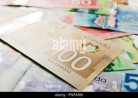 Money from Canada: Canadian Dollars. Bills spread and variation of amounts. Stock Photo