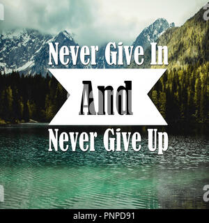 Inspirational Quotes Never give in and never give up, positive, motivational Stock Photo