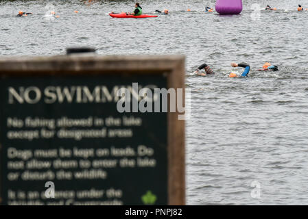London, UK. 22nd September 2018. Swimmers in the Serpentine taking part in Swim Serpentine the one-day open water swimming festival in Hyde Park. Credit: Matthew Chattle/Alamy Live News Stock Photo