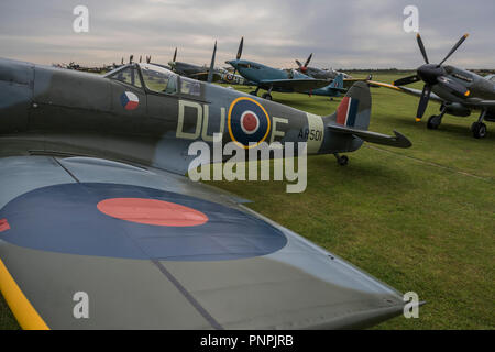 Duxford, UK. 22nd Sept 2018. Spitfires on the flight line - The Duxford Battle of Britain Air Show is a finale to the centenary of the Royal Air Force (RAF) with a celebration of 100 years of RAF history and a vision of its innovative future capability. Credit: Guy Bell/Alamy Live News Stock Photo