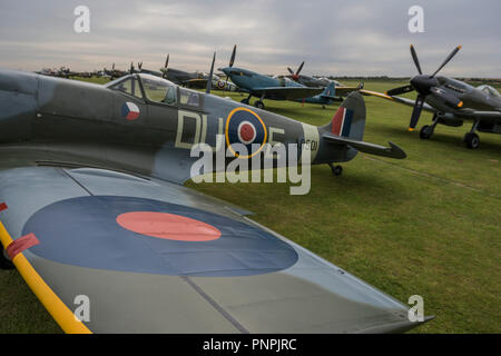 Duxford, UK. 22nd Sept 2018. Spitfires on the flight line - The Duxford Battle of Britain Air Show is a finale to the centenary of the Royal Air Force (RAF) with a celebration of 100 years of RAF history and a vision of its innovative future capability. Credit: Guy Bell/Alamy Live News Stock Photo