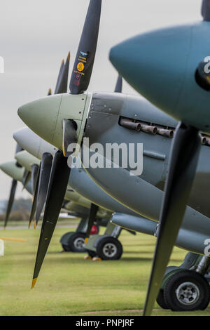 Duxford, UK. 22nd Sept 2018. Spitfires on the flight line - The Duxford Battle of Britain Air Show is a finale to the centenary of the Royal Air Force (RAF) with a celebration of 100 years of RAF history and a vision of its innovative future capability. Credit: Guy Bell/Alamy Live News Stock Photo