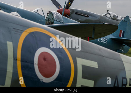 Duxford, UK. 22nd Sept 2018. Spitfires on the flight line - The Duxford Battle of Britain Air Show is a finale to the centenary of the Royal Air Force (RAF) with a celebration of 100 years of RAF history and a vision of its innovative future capability. Credit: Guy Bell/Alamy Live News Stock Photo