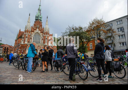 Krakow, Poland. 22nd Sep, 2018. People hold their bikes before the Mass Mass Bicycle Ride as part of the European Day without Car at Podgorze Square. Credit: Omar Marques/SOPA Images/ZUMA Wire/Alamy Live News Stock Photo