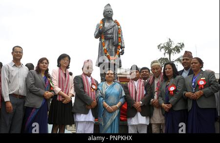 (180922) -- LALITPUR, Sept. 22, 2018 (Xinhua) -- Nepal's President Bidhya Devi Bhandari (C) and Chinese Ambassador to Nepal Yu Hong (3rd L) take group photo after unveiling the statue of renowned Nepali artist Arniko in Lalitpur, Nepal, on Sept. 22, 2018. The full-length statue of renowned Nepali artist Arniko, who is also known as a national hero, was unveiled here on Saturday. (Xinhua/Sunil Sharma)(dh) Stock Photo