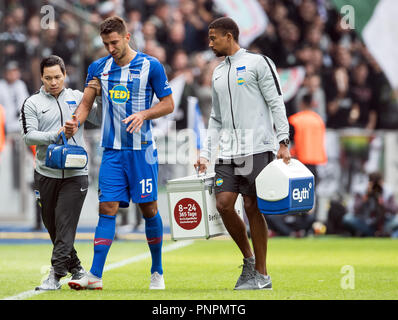 22 September 2018, Berlin: Soccer: Bundesliga, Hertha BSC vs Borussia Moenchengladbach, 4th matchday at the Olympic Stadium. Hertha's Marko Grujic is led off the pitch injured. Photo: Soeren Stache/dpa - IMPORTANT NOTICE: DFL an d DFB regulations prohibit any use of photographs as image sequences and/or quasi-video. Stock Photo