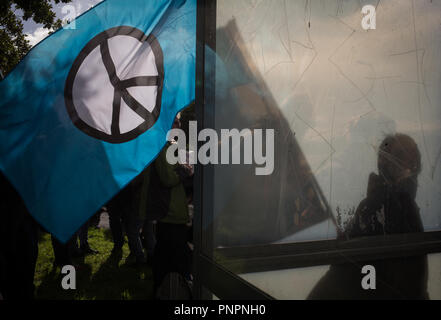 Faslane, Scotland, on 22 September 2018. 'Nae (No) Nukes Anywhere' anti-nuclear weapons demonstration at the Faslane Peace Camp and walking to a rally outside HM Naval Base Clyde, home to the core of the UK's Submarine Service, in protest against Trident nuclear missiles. The rally was attended by peace protestors from across the UK who came 'to highlight the strength of support from many UN member states for Scotland, a country hosting nuclear weapons against its wishes'. Photo Credit Jeremy Sutton-Hibbert/ Alamy News. Stock Photo