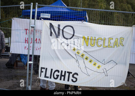 Faslane, Scotland, on 22 September 2018. 'Nae (No) Nukes Anywhere' anti-nuclear weapons demonstration at the Faslane Peace Camp and walking to a rally outside HM Naval Base Clyde, home to the core of the UK's Submarine Service, in protest against Trident nuclear missiles. The rally was attended by peace protestors from across the UK who came 'to highlight the strength of support from many UN member states for Scotland, a country hosting nuclear weapons against its wishes'. Photo Credit Jeremy Sutton-Hibbert/ Alamy News. Stock Photo