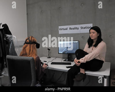 1 Old Street Yard, Old Street, London, England. 22nd Sept. 2018 A visitor to AKT11 Studio enjoys a virtual reality demonstration during Open House London 2018. At White Collar Factory. Credit: Judi Saunders/Alamy Live News Stock Photo