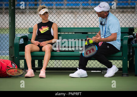 September 22, 2018 - Elina Svitolina of the Ukraine listens to Nick Saviano at the 2018 Dongfeng Motor Wuhan Open WTA Premier 5 tennis tournament Credit: AFP7/ZUMA Wire/Alamy Live News Stock Photo