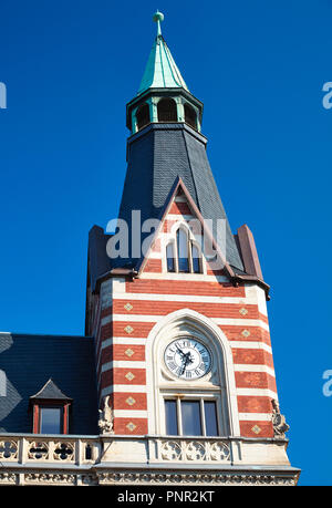 Main Post Office in Erfurt, Thuringia, Germany. Close-up on corner tower with historical clock. Stock Photo