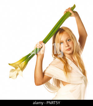 Children. Studio portrait of young blond hair girl holding a long-stemmed lwhite lily above her head.