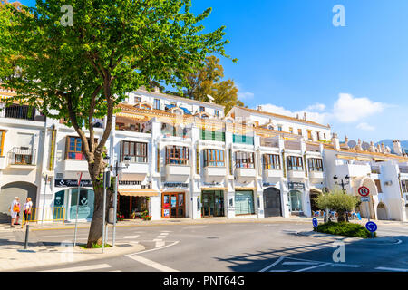 MIJAS TOWN, SPAIN - MAY 9, 2018: Beautiful buildings in picturesque village of Mijas famous for white typical architecture of Andalusia. Spain is seco Stock Photo