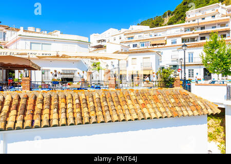 MIJAS TOWN, SPAIN - MAY 9, 2018: Beautiful buildings in picturesque village of Mijas famous for white typical architecture of Andalusia. Spain is seco Stock Photo