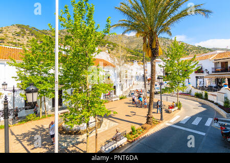 MIJAS VILLAGE, SPAIN - MAY 9, 2018: Street in picturesque white village of Mijas, Andalusia. Southern Spain is famous for mountain villages with white Stock Photo