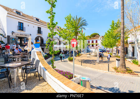MIJAS TOWN, SPAIN - MAY 9, 2018: Beautiful buildings in picturesque village of Mijas famous for white typical architecture of Andalusia. Spain is seco Stock Photo