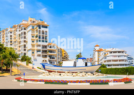 Street with apartment buildings in Estepona town, Costa del Sol, Spain Stock Photo