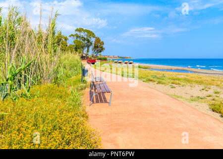 Coastal path along beach near Estepona town on Costa del Sol, Spain Stock Photo