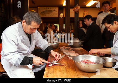 Japanese cook preparing eels at Narita Temple near Tokyo Stock Photo