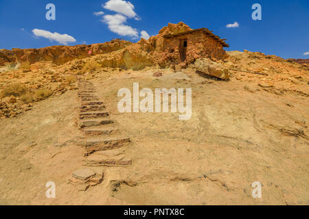 Abandoned houses built in the rock on the Calico mountains in Calico. Calico is a ghost town and former Mining in the Mojave Desert region of Southern California, United States. Stock Photo