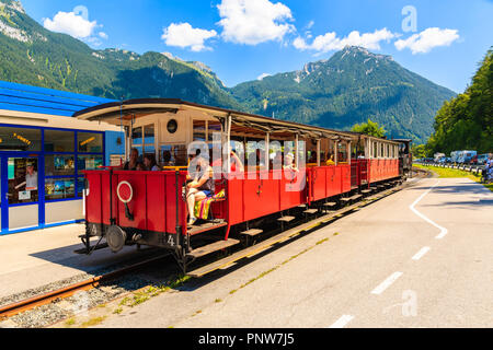 ACHENSEE LAKE, AUSTRIA - JUL 31, 2018: Train with tourists on station at Achensee lake on sunny summer day, Tirol. During summer this place is very po Stock Photo